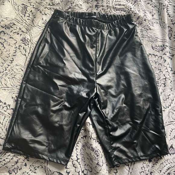 Fashion Nova leather biker shorts and blue shirt - Picture 4 of 6